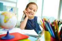 Girl with school supplies