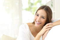 Smiling Woman On Couch
