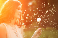 Woman In Summer With Dandelion